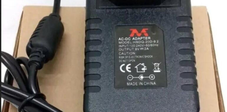 Contoh adaptor 9 volt 2 ampere